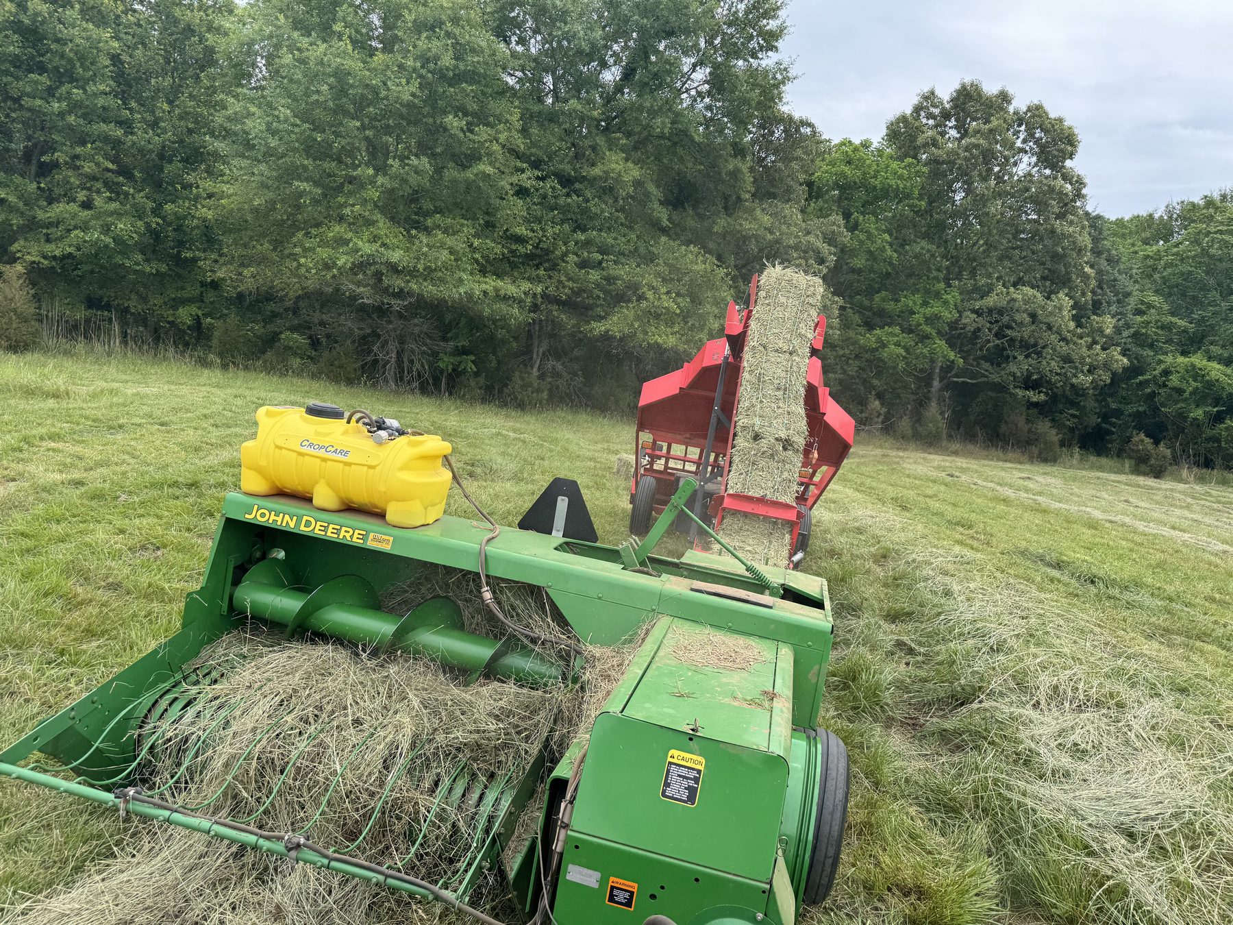 John Deere baler at work